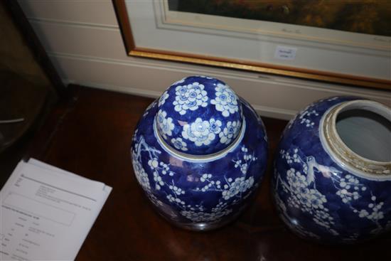 A pair of Chinese blue and white jars and covers, c.1900, Kangxi mark (one a.f.)